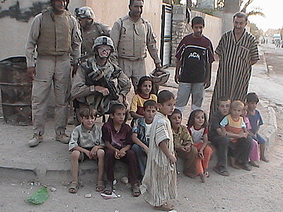 Click image for larger version

Name:	Me with Iraqi family.JPG
Views:	160
Size:	133.6 KB
ID:	219020