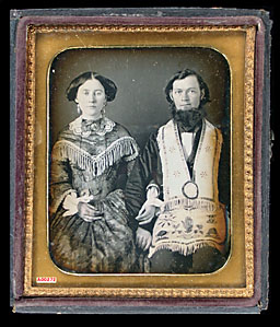 Click image for larger version

Name:	Man with beard, dressed in Odd Fellows apron and wife.jpg
Views:	118
Size:	32.7 KB
ID:	228524