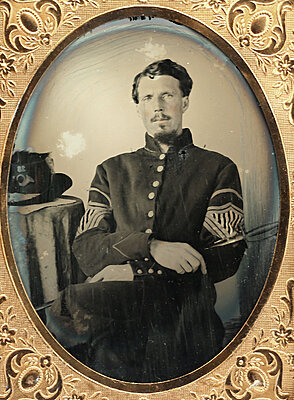 Click image for larger version

Name:	1-4 Plate Ambrotype Civil War Soldier - Hardee Hat &amp;amp; Sword.jpg
Views:	253
Size:	200.6 KB
ID:	232179